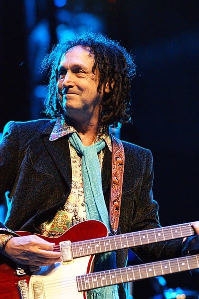 Mike Campbell standing on a stage