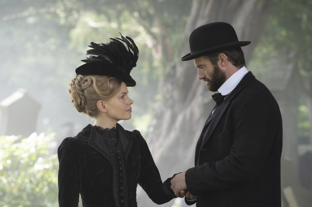 A man and woman looking at eachother