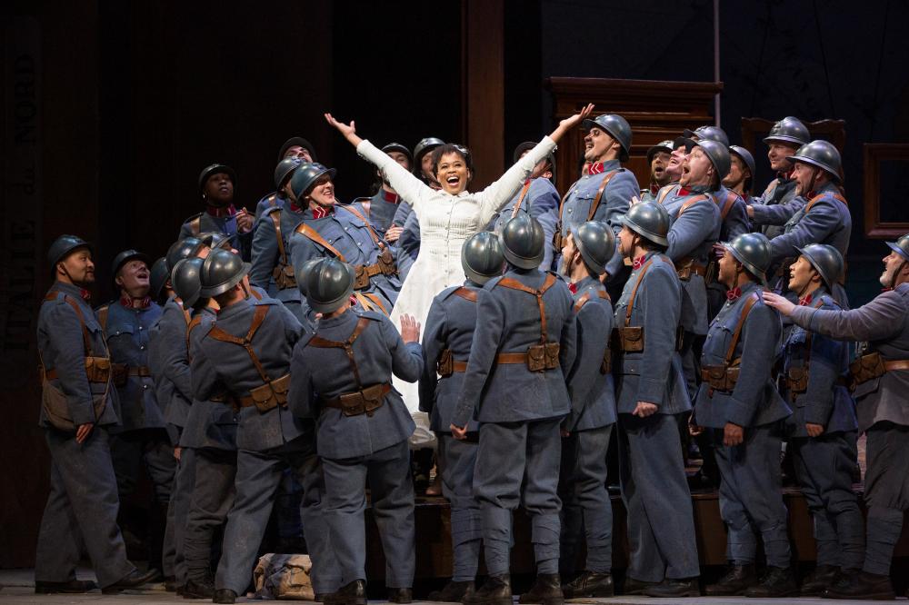 Woman surrounded by a large number of soldiers