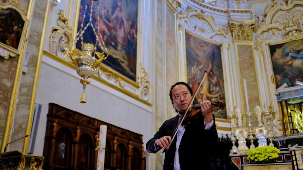 Man playing a stringed instrument