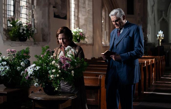 man and woman in church image