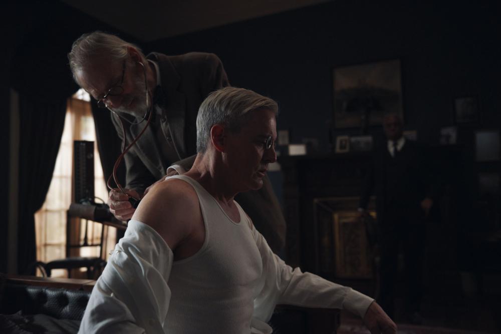 A doctor checking on a patient image