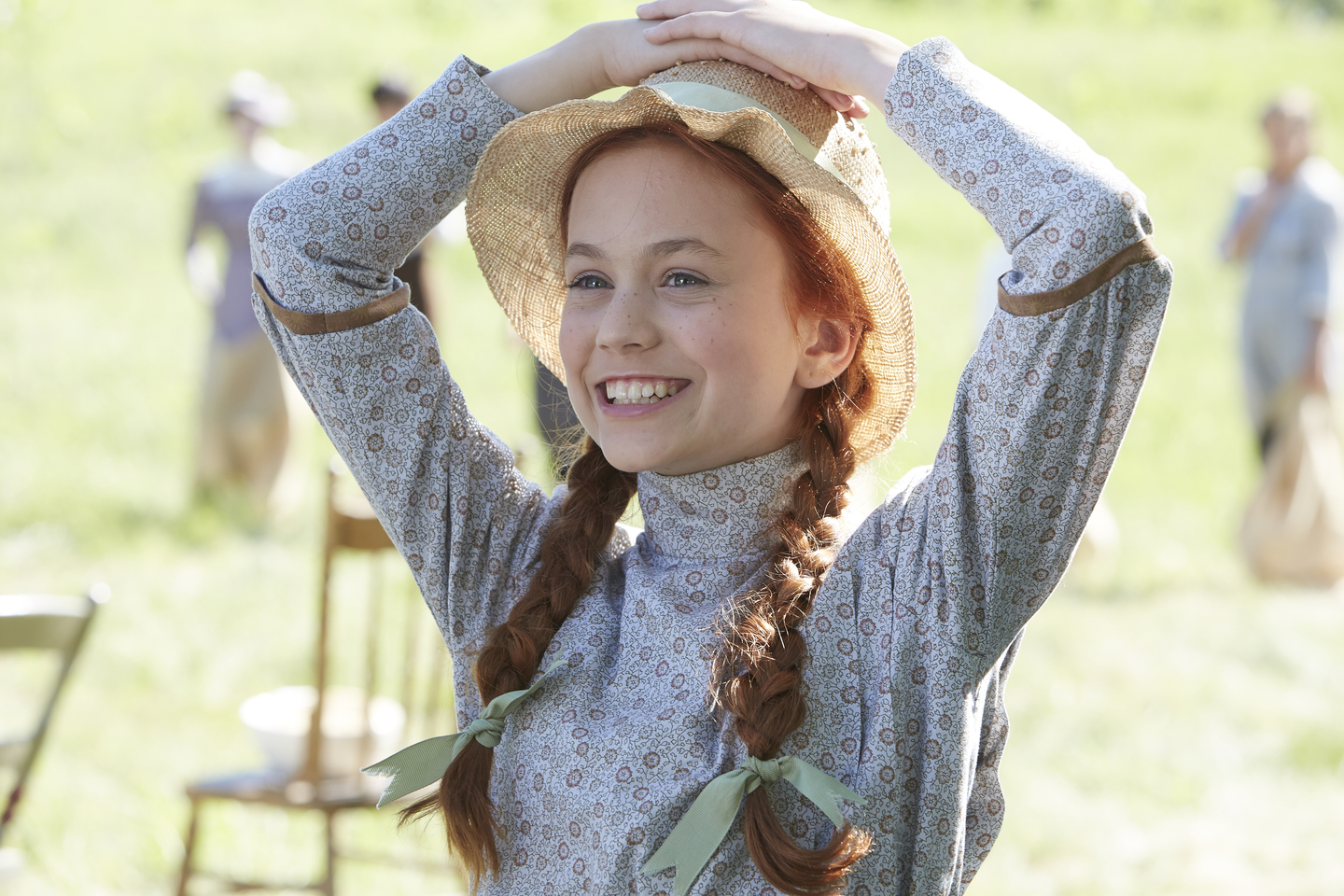 anne with hands on head