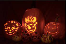 pbs kids carved pumpkins with light on the inside of the pumpkin