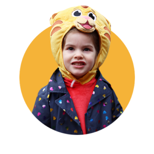 child wearing daniel tiger hat