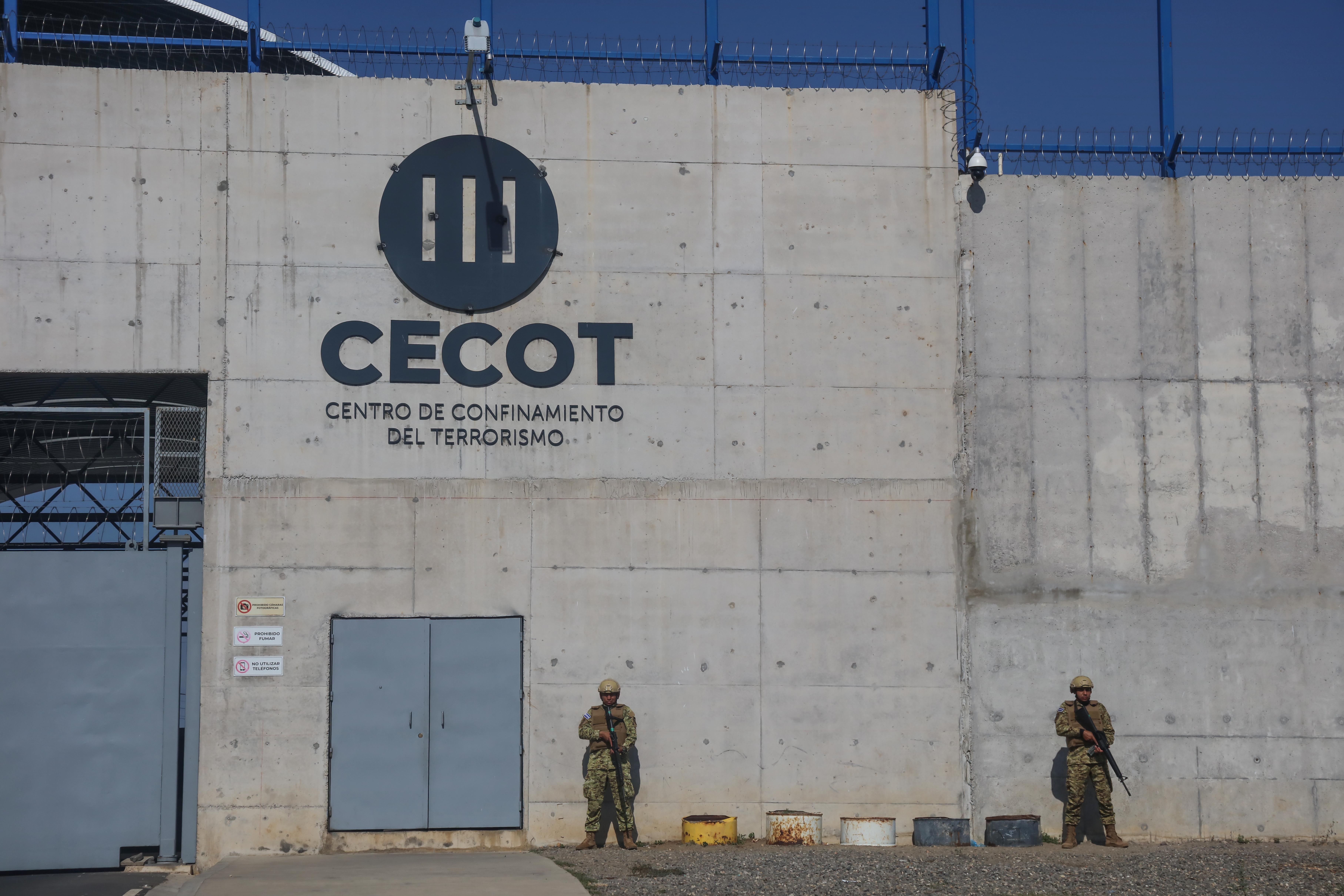 Members of the Salvadorian army stand guard at maximum security penitentiary CECOT on April 4, in Tecoluca, San Vicente, El Salvador.