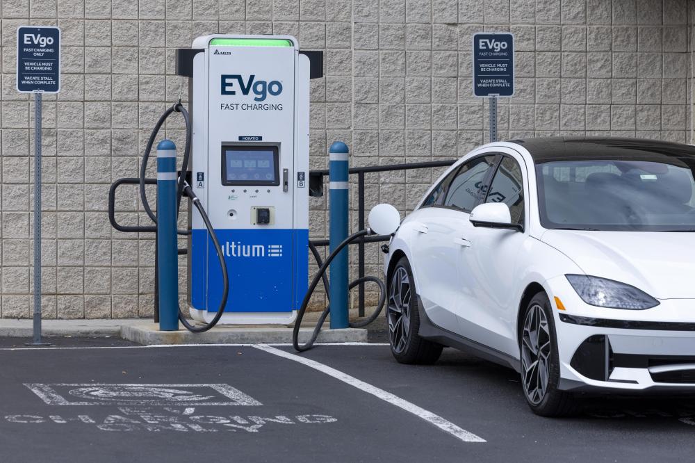 An electric vehicle is seen charging in New Jersey on June 11, 2024. 