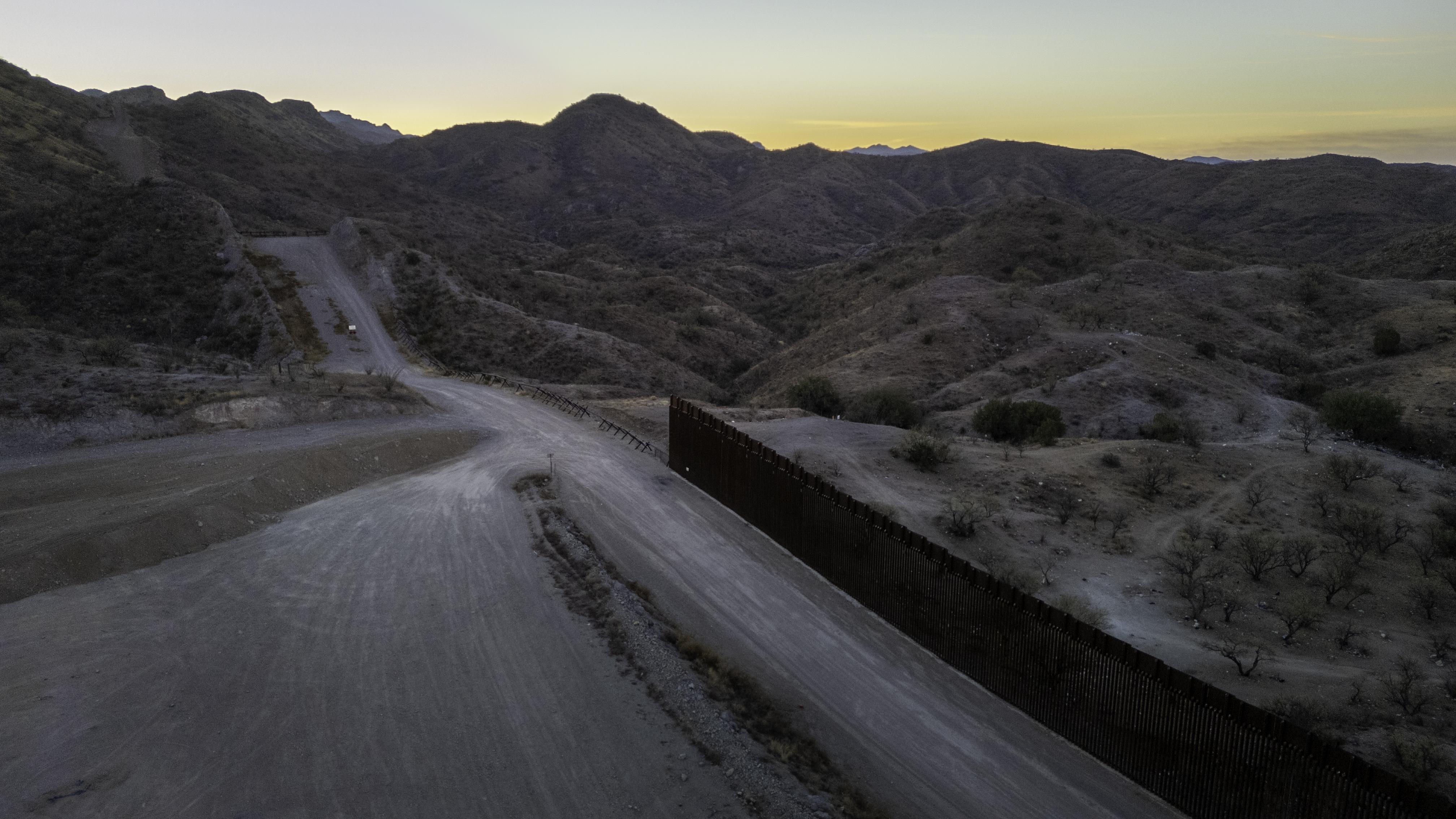 From an aerial view, the U.S.-Mexico border fence ends with a gap on Jan. 20, 2025 near Sasabe, Ariz. Republicans