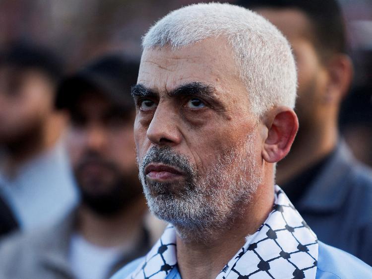 Hamas leader Yahya Sinwar looks on as Palestinian Hamas supporters take part in an anti-Israel rally over tension in Jerusalem