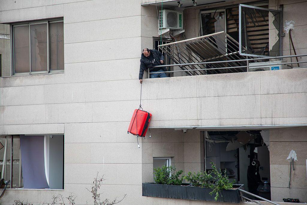 A member of police special forces stands guard on top of a vehicle in downtown Tehran, Iran, Monday.