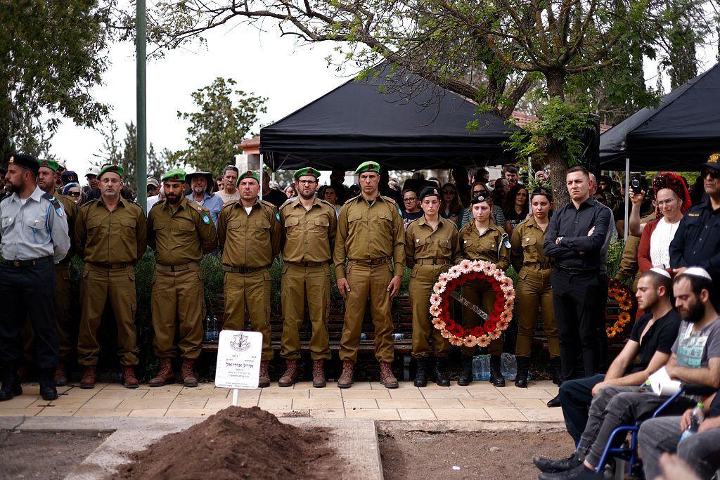 Comrades, relatives and friends of Sgt. Maj. (Res.) Ayal Uriel Bianco, who was reportedly killed in combat in southern Lebanon, attend his funeral in Katzrin in the Israeli-annexed Golan Heights on Tuesday.