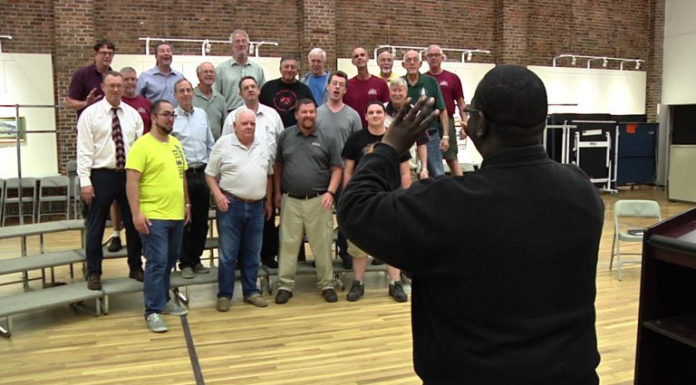 The Capital Chordsmen Share a Heritage of Harmony A photo of a photo of a group photo