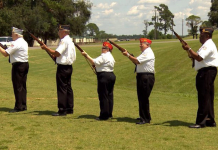 Veterans Honoring Veterans Veterans aim their guns toward the sky