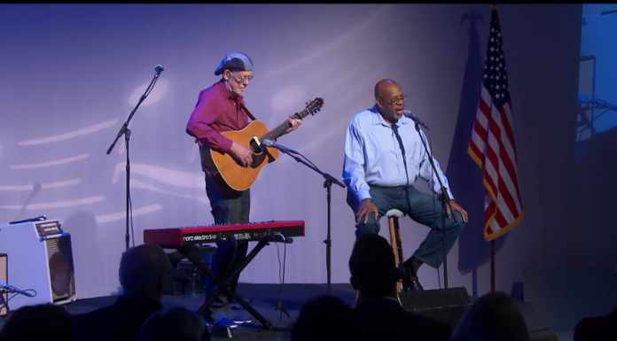 Where Have All the Flowers Gone? Musicians preform on stage