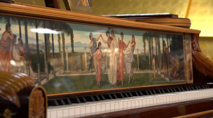 Steinway Art Case Pianos on display in Tallahassee Vintage wooden piano with painting of women dancing
