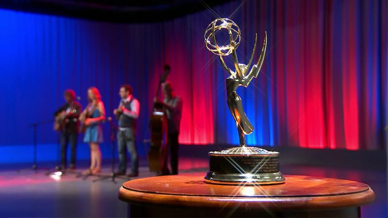 A Lyrical Lengthening of the Local Routes Theme Song Dancers preform on stage