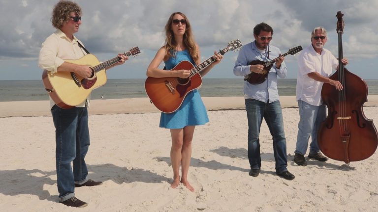 Belle and the Band | Local Routes Theme Official Video Band preforms on stage