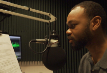 How WFSU Prepares for a Hurricane Man on radio talk show talks into microphone to inform listeners on how to prepare for approaching storm