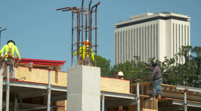 Local Routes (Episode 501) A man standing in front of a building