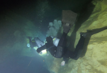 Cave Creature Discovered|Mysteries of the Floridan Aquifer A man diving in an underwater cave with scuba gear