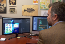 American Graduate: Application Developer A man sitting front of a computer