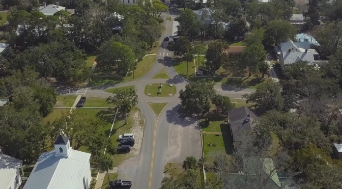 Saving The Apalachicola Squares A house with trees in the background