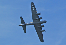 Saint Marks Bomber Rediscovered A large air plane flying in the sky