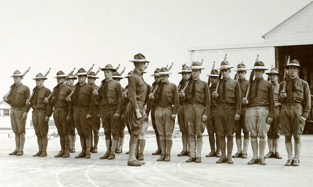 A group of people in uniform posing for a photo