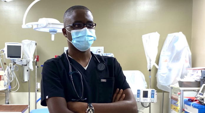 The Journey: Emergency Room Doctor Juvenal Havyarimana A man standing in a room