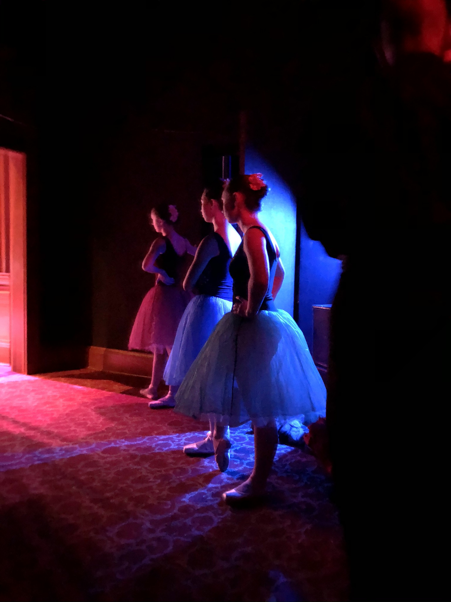 A person standing in a dark room