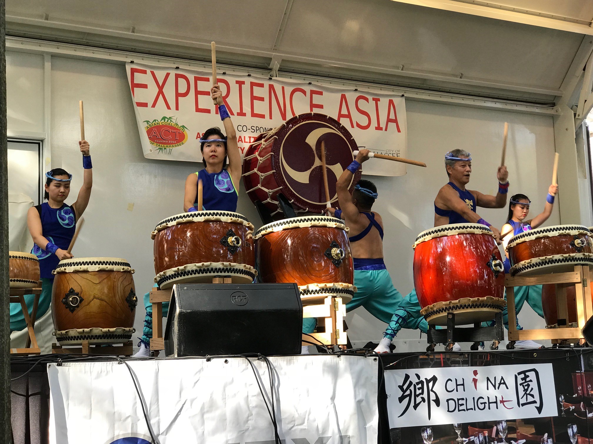 A group of people performing on a counter