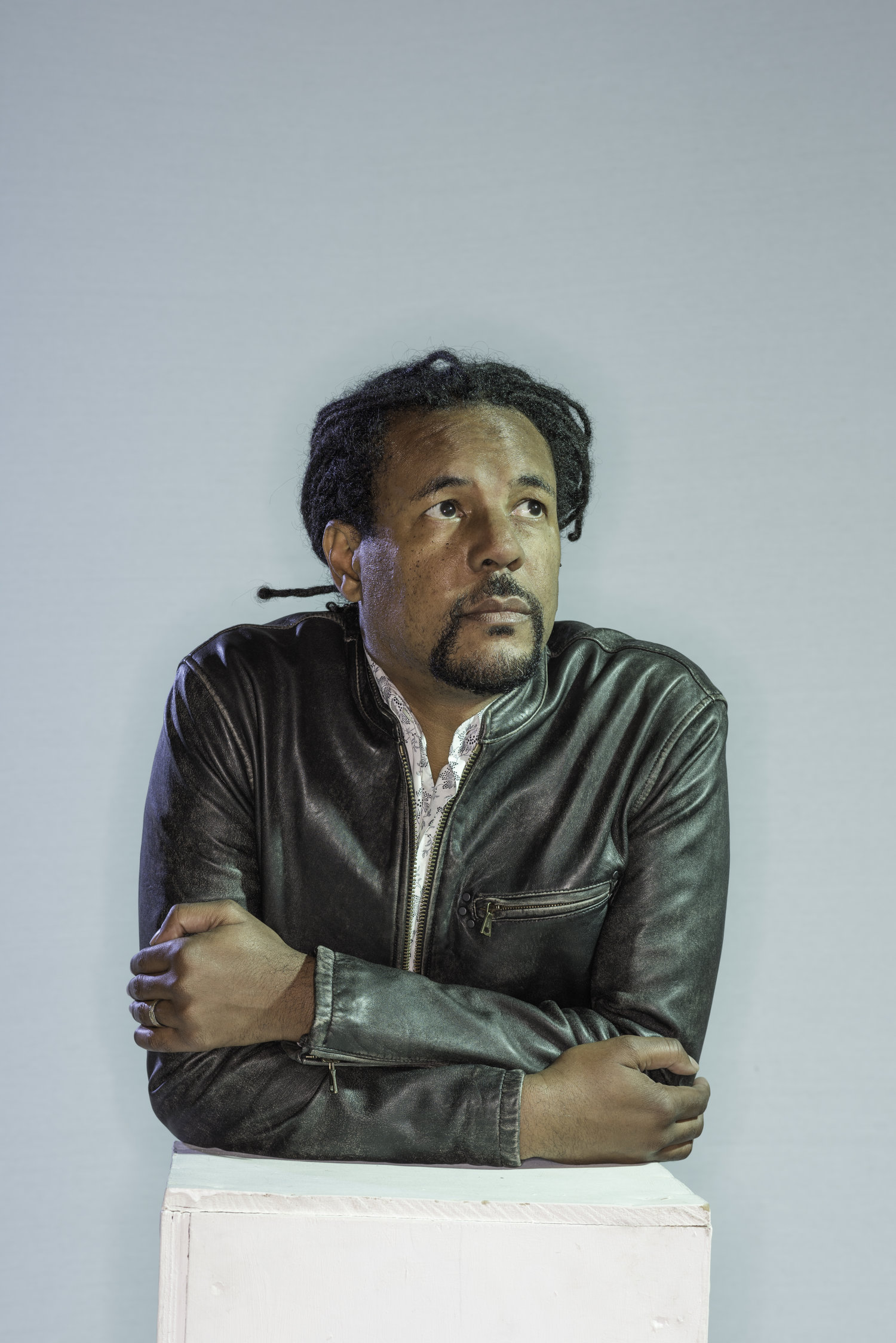 Colson Whitehead sitting in a chair