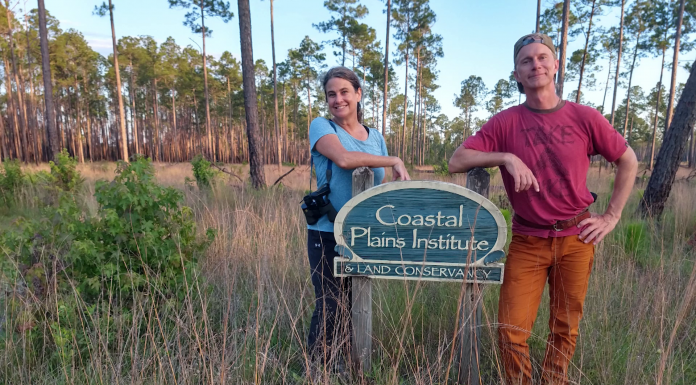 Apalachicola Lowlands Preserve: A Family’s Labor of Love A man standing in front of a tree posing for the camera