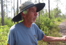 Nokuse Plantation & its 300 Year Mission A man holding a fish