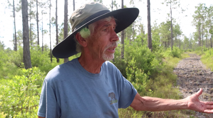 Nokuse Plantation & its 300 Year Mission A man holding a fish