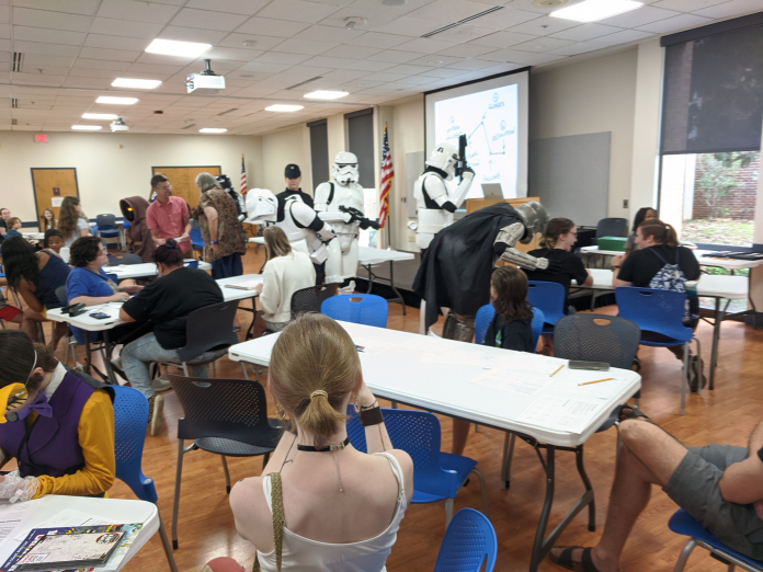 A group of people sitting at a table