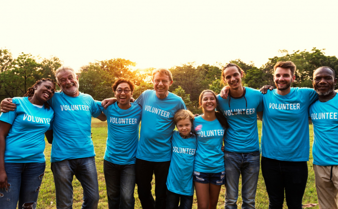 A group of people posing for the camera