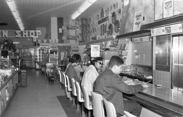 Exploring Tallahassee’s February history day by day People sitting at a luinch counter in black and white photo