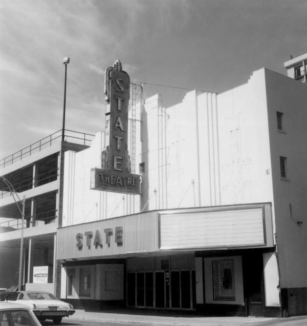White building with "State" on the marquee sign.