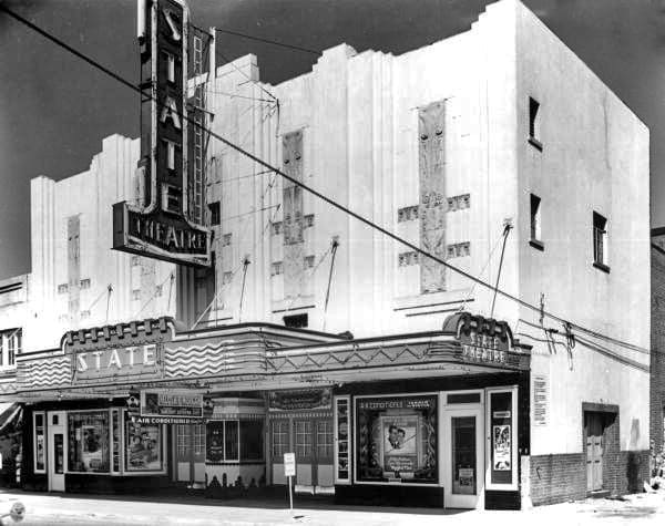An old photo of movie theatre street