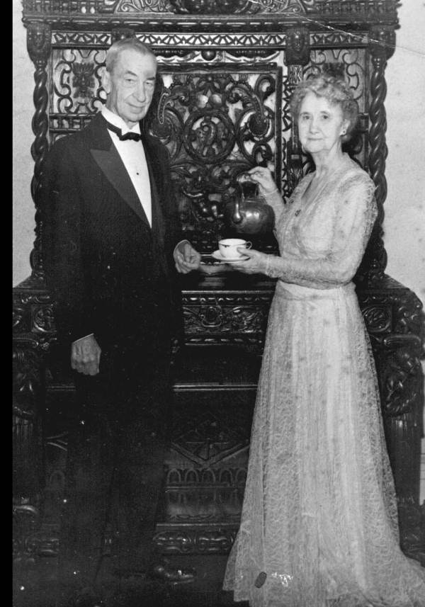 A vintage photo of William V. Knott and his wife posing for a picture