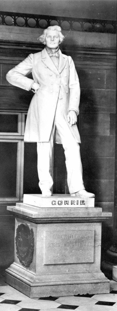 A statue of a man standing on a pedestal.