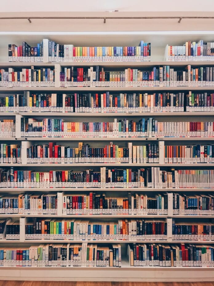 A close up of a book shelf filled with books