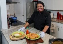 Cooking with Chef Fe A man standing in front of a plate of food
