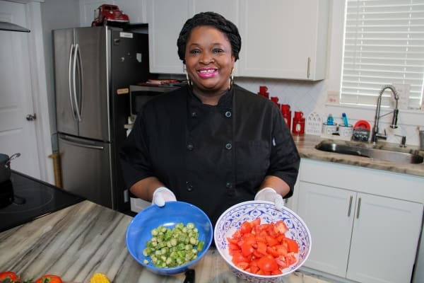 A person preparing food in a kitchen