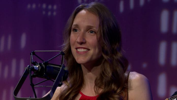 A woman smiling for the camera