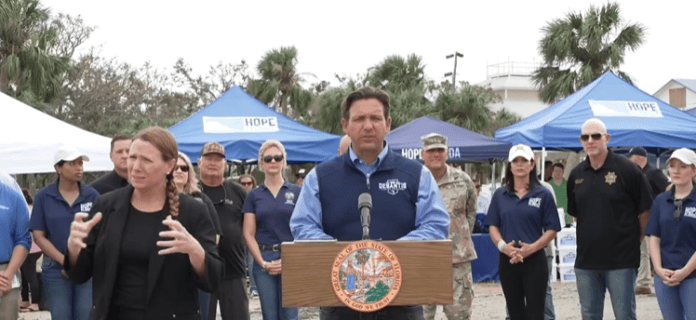 Ron DeSantis et al. posing for the camera