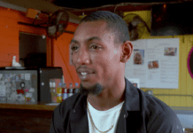 Water Ice in the Panhandle|The Spirit of Rebuilding at Railroad Square A man standing in front of a store