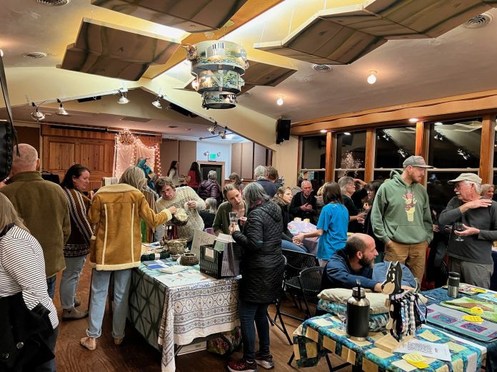 A group of people standing in a room