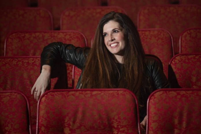 A person sitting on a leather chair